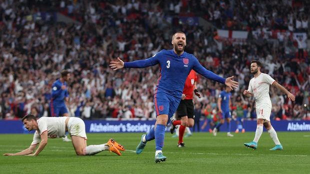 Soccer Football - International Friendly - England v Switzerland - Wembley Stadium, London, Britain - March 26, 2022 England's Luke Shaw celebrates scoring their first goal Action Images via Reuters/Matthew Childs