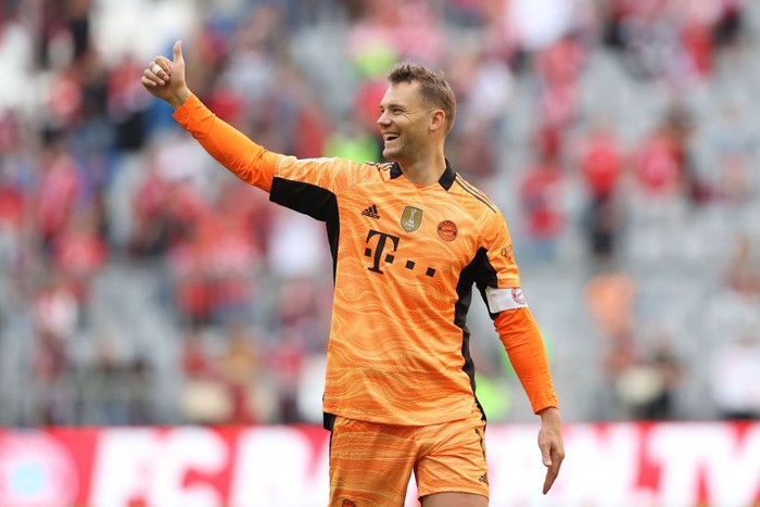 Manuel Neuer MUNICH, GERMANY - SEPTEMBER 18: Manuel Neuer of FC Bayern München celebrates after winning the Bundesliga match between FC Bayern München and VfL Bochum at Allianz Arena on September 18, 2021 in Munich, Germany. (Photo by Alexander Hassenstein/Getty Images)