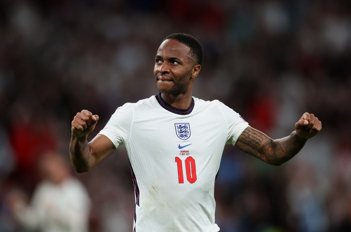 LONDON, ENGLAND - JULY 07: Raheem Sterling of England celebrates following his team's victory in the UEFA Euro 2020 Championship Semi-final match between England and Denmark at Wembley Stadium on July 07, 2021 in London, England. (Photo by Carl Recine - Pool/Getty Images)