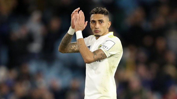 LEEDS, ENGLAND - JANUARY 22: Raphinha of Leeds United applauds fans after their sides defeat during the Premier League match between Leeds United and Newcastle United at Elland Road on January 22, 2022 in Leeds, England. (Photo by George Wood/Getty Images)