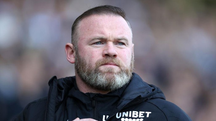 DERBY, ENGLAND - MARCH 19: Wayne Rooney, Manager of Derby County looks on prior to the Sky Bet Championship match between Derby County and Coventry City at Pride Park Stadium on March 19, 2022 in Derby, England. (Photo by Matthew Lewis/Getty Images)