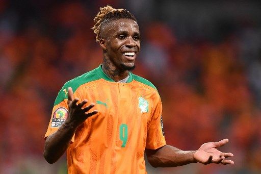 Ivory Coast's forward Wilfried Zaha reacts after drawing the Group E Africa Cup of Nations (CAN) 2021 football match between Ivory Coast and Sierra Leone at Stade de Japoma in Douala on January 16, 2022. (Photo by CHARLY TRIBALLEAU / AFP)