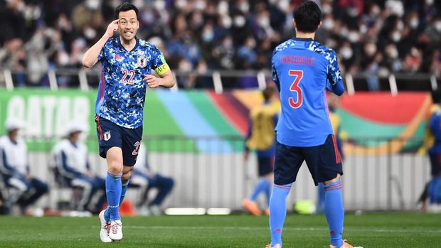Japan's Maya Yoshida gestures after scoring a goal during the FIFA World Cup Qatar 2022 Asian zone qualification football match between Japan and Vietnam at Saitama Stadium in Saitama on March 29, 2022. (Photo by CHARLY TRIBALLEAU / AFP)