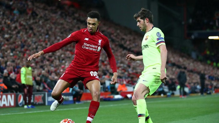 LIVERPOOL, ENGLAND - MAY 07:  Trent Alexander-Arnold of Liverpool takes on Sergi Roberto of Barcelona during the UEFA Champions League Semi Final second leg match between Liverpool and Barcelona at Anfield on May 07, 2019 in Liverpool, England. (Photo by Clive Brunskill/Getty Images)