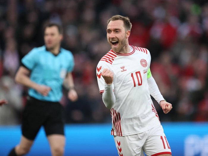 COPENHAGEN, DENMARK - MARCH 29: Christian Eriksen of Denmark celebrates their side's second goal scored by Jesper Lindstrom of Denmark (not pictured) during the international friendly match between Denmark and Serbia at Parken Stadium on March 29, 2022 in Copenhagen, Denmark. (Photo by Martin Rose/Getty Images)