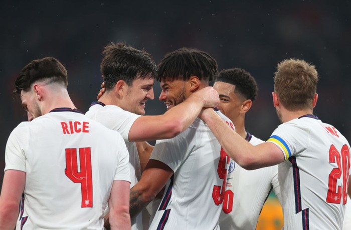 LONDON, ENGLAND - MARCH 29: Tyrone Mings of England celebrates with teammate Harry Maguire after scoring their teams third goal during the international friendly match between England and Cote DIvoire at Wembley Stadium on March 29, 2022 in London, England. (Photo by Catherine Ivill/Getty Images)