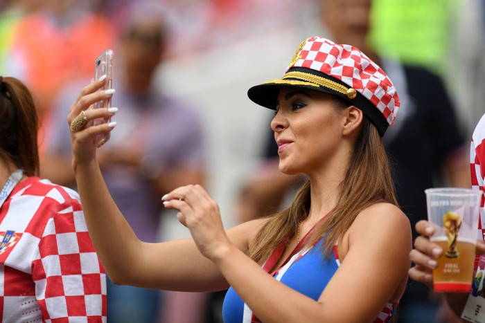 MOSCOW, RUSSIA - JULY 15:  A Croatia fan enjoys the pre match atmosphere prior to the 2018 FIFA World Cup Final between France and Croatia at Luzhniki Stadium on July 15, 2018 in Moscow, Russia.  (Photo by Matthias Hangst/Getty Images)