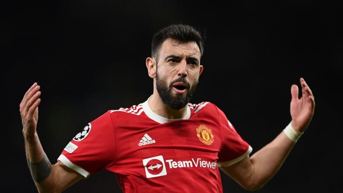MANCHESTER, ENGLAND - MARCH 15: Bruno Fernandes of Manchester United reacts during the UEFA Champions League Round Of Sixteen Leg Two match between Manchester United and Atletico Madrid at Old Trafford on March 15, 2022 in Manchester, England. (Photo by Michael Regan/Getty Images)