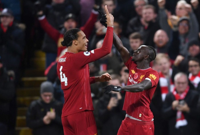 LIVERPOOL, ENGLAND - NOVEMBER 10: Sadio Mane of Liverpool celebrates after scoring his team's third goal with teammate Virgil van Dijk during the Premier League match between Liverpool FC and Manchester City at Anfield on November 10, 2019 in Liverpool, United Kingdom. (Photo by Laurence Griffiths/Getty Images)