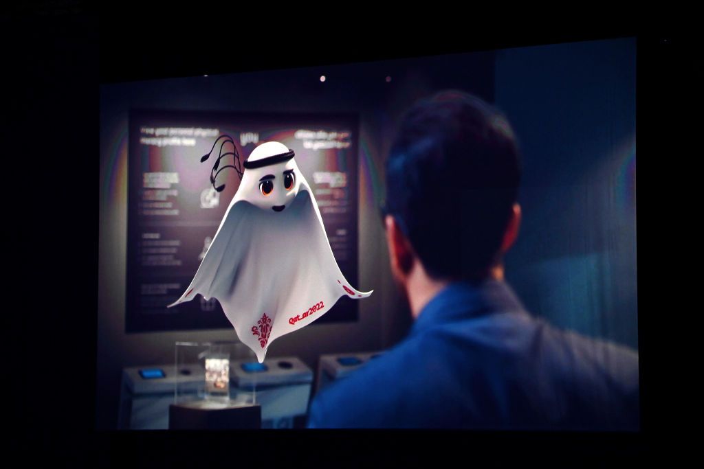 DOHA, QATAR - APRIL 01: La'eeb, The Fifa World Cup Qatar 2022 Mascot is announced on a LED Screen during the FIFA World Cup Qatar 2022 Final Draw at the Doha Exhibition Center on April 01, 2022 in Doha, Qatar. (Photo by Shaun Botterill/Getty Images)
