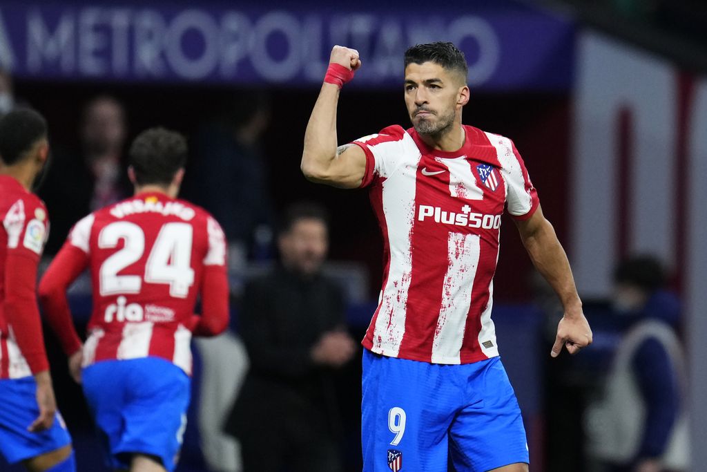 Atletico Madrid's Luis Suarez celebrates after scoring a penalty, his side's second goal, during a Spanish La Liga soccer match between Atletico Madrid and Alaves at the Wanda Metropolitano stadium in Madrid, Spain, Saturday, April 2, 2022. (AP Photo/Manu Fernandez)