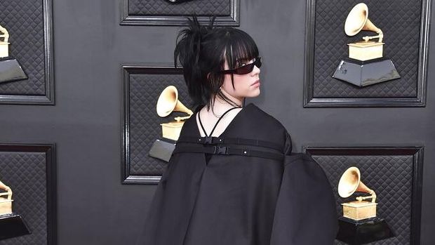 Billie Eilish arrives at the 64th Annual Grammy Awards at the MGM Grand Garden Arena on Sunday, April 3, 2022, in Las Vegas. (Photo by Jordan Strauss/Invision/AP)