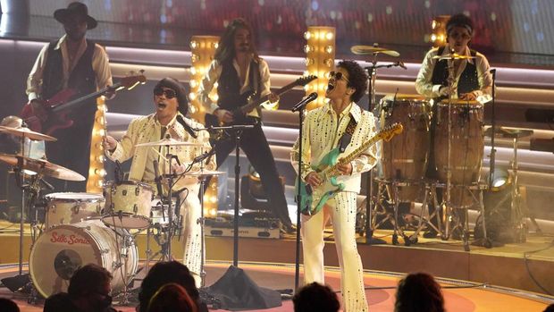 Anderson Paak, left, and Bruno Mars of Silk Sonic perform at the 64th Annual Grammy Awards on Sunday, April 3, 2022, in Las Vegas. (AP Photo/Chris Pizzello)