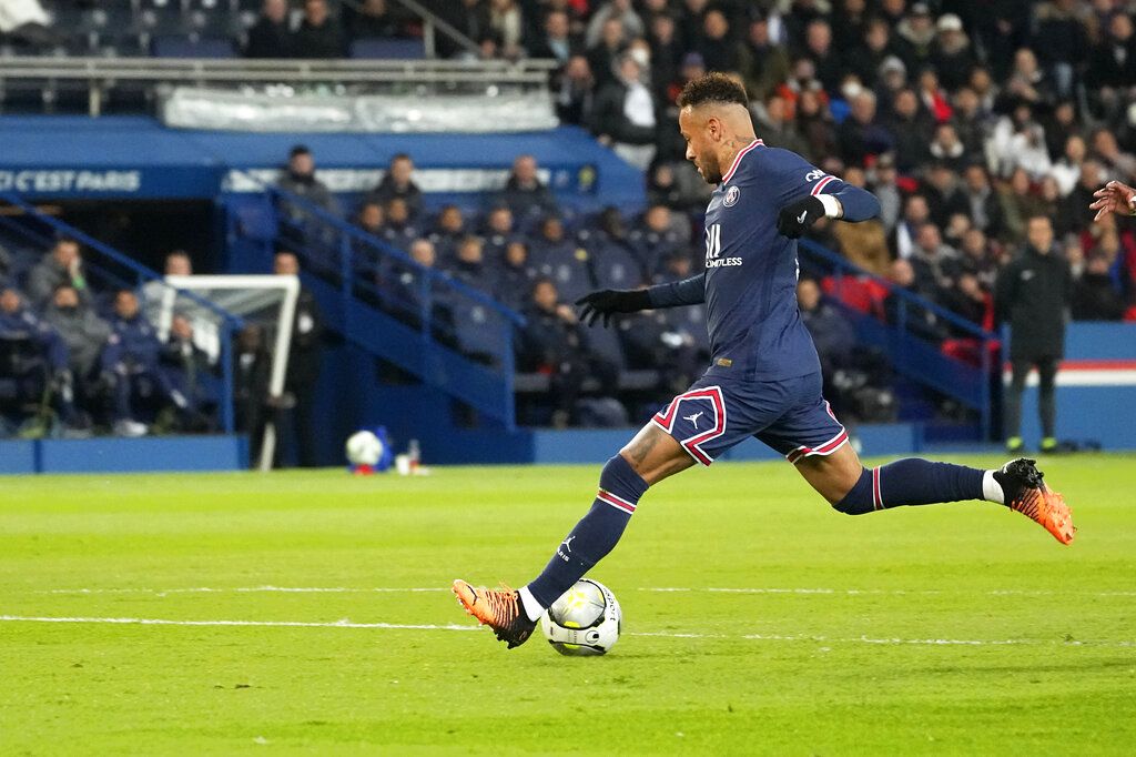PSG's Neymar scores his side's opening goal during the French League One soccer match between Paris Saint Germain and FC Lorient at Parc des Princes stadium in Paris, Sunday, April 3, 2022. (AP Photo/Michel Euler)