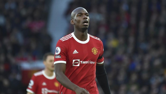 Manchester Uniteds Paul Pogba during the English Premier League soccer match between Manchester United and Tottenham Hotspur at Old Trafford in Manchester, England, Saturday, March 12, 2022. (AP Photo/Rui Vieira)