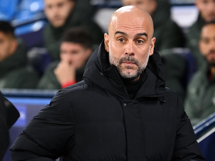 MANCHESTER, ENGLAND - APRIL 05: Pep Guardiola, Manager of Manchester City looks on prior to the UEFA Champions League Quarter Final Leg One match between Manchester City and Atletico Madrid at City of Manchester Stadium on April 05, 2022 in Manchester, England. (Photo by Michael Regan/Getty Images)