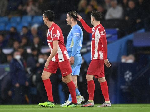 MANCHESTER, ENGLAND - APRIL 05: Jack Grealish of Manchester City taunts Sime Vrsaljko of Atletico Madrid during the UEFA Champions League Quarter Final Leg One match between Manchester City and Atletico Madrid at City of Manchester Stadium on April 05, 2022 in Manchester, England. (Photo by Michael Regan/Getty Images)
