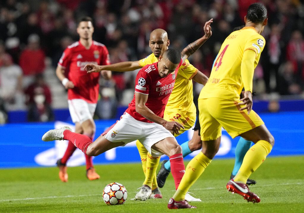 Liverpool's Ibrahima Konate, 2nd right, celebrates with team mates after scoring his side's opening goal during the Champions League quarterfinals, first leg, soccer match between Benfica and Liverpool at the Luz stadium in Lisbon, Tuesday, April 5, 2022. (AP Photo/Armando Franca)