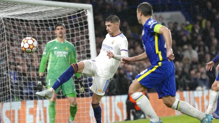Real Madrids Federico Valverde kicks the ball during a Champions League first-leg quarterfinal soccer match between Chelsea and Real Madrid at Stamford Bridge stadium in London, Wednesday, April 6, 2022. (AP Photo/Kirsty Wigglesworth)