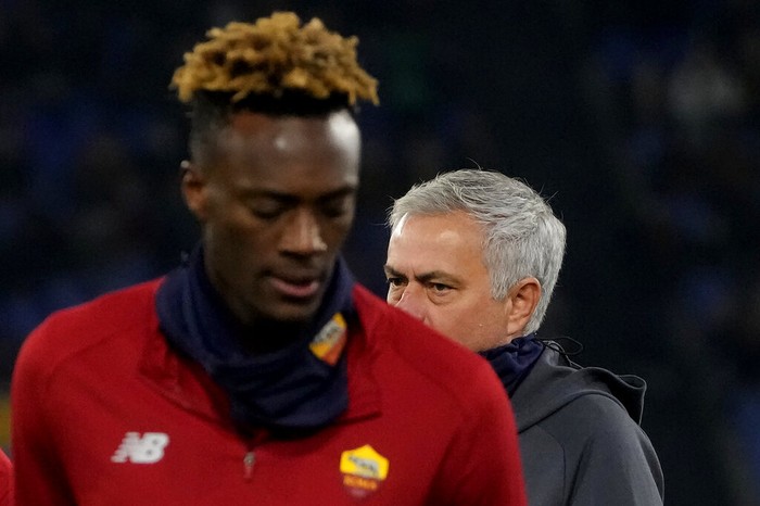 Romas head coach Jose Mourinho, right, and Romas Tammy Abraham during a warm up before the Italian Serie A, soccer match between Roma and Sampdoria at Romes Olympic stadium, Wednesday, Dec. 22, 2021. (AP Photo/Gregorio Borgia)