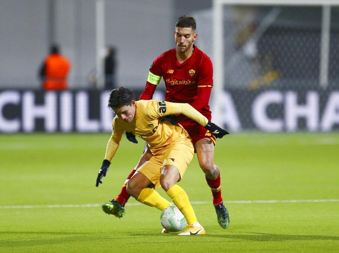 Bodo Glimt's Hugo Vetlesen, Ulrik Saltnes, Brice Wembangomo Runar Espejord and Elias Kristoffersen Hagen celebrate a goal during the Europa Conference League quarterfinal soccer match between Bodo Glimt and AS Roma at Aspmyra stadium, Bodo, Norway, Thursday April 7, 2022. (Mats Torbergsen/NTB via AP)