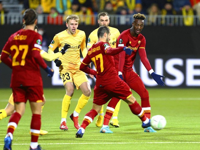 Bodo Glimt's Hugo Vetlesen, Ulrik Saltnes, Brice Wembangomo Runar Espejord and Elias Kristoffersen Hagen celebrate a goal during the Europa Conference League quarterfinal soccer match between Bodo Glimt and AS Roma at Aspmyra stadium, Bodo, Norway, Thursday April 7, 2022. (Mats Torbergsen/NTB via AP)