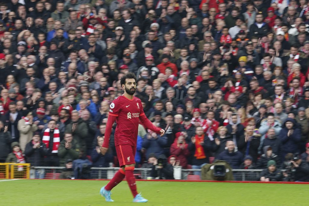 Liverpool's Mohamed Salah leaves the field during the English Premier League soccer match between Liverpool and Watford at Anfield stadium in Liverpool, England, Saturday, April 2, 2022. (AP Photo/Jon Super)