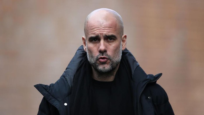 BURNLEY, ENGLAND - APRIL 02: Pep Guardiola, Manager of Manchester City arrives at the stadium prior to the Premier League match between Burnley and Manchester City at Turf Moor on April 02, 2022 in Burnley, England. (Photo by Jan Kruger/Getty Images)