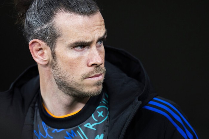 Real Madrids Gareth Bale stands prior the Spanish La Liga soccer match between Real Madrid and Getafe at the Santiago Bernabeu stadium in Madrid, Saturday, April 9, 2022. Real Madrid won 2-0. (AP Photo/Manu Fernandez)
