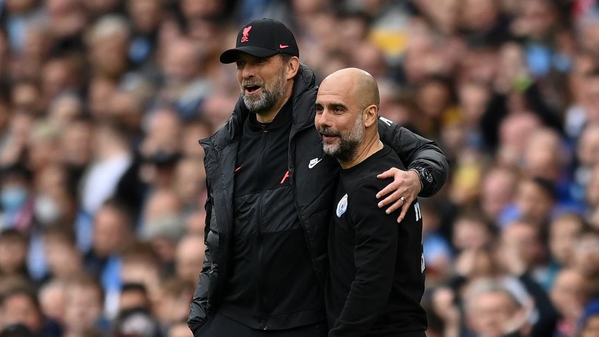 Juergen Klopp dan Pep Guardiola. (Foto: Getty Images/Michael Regan)