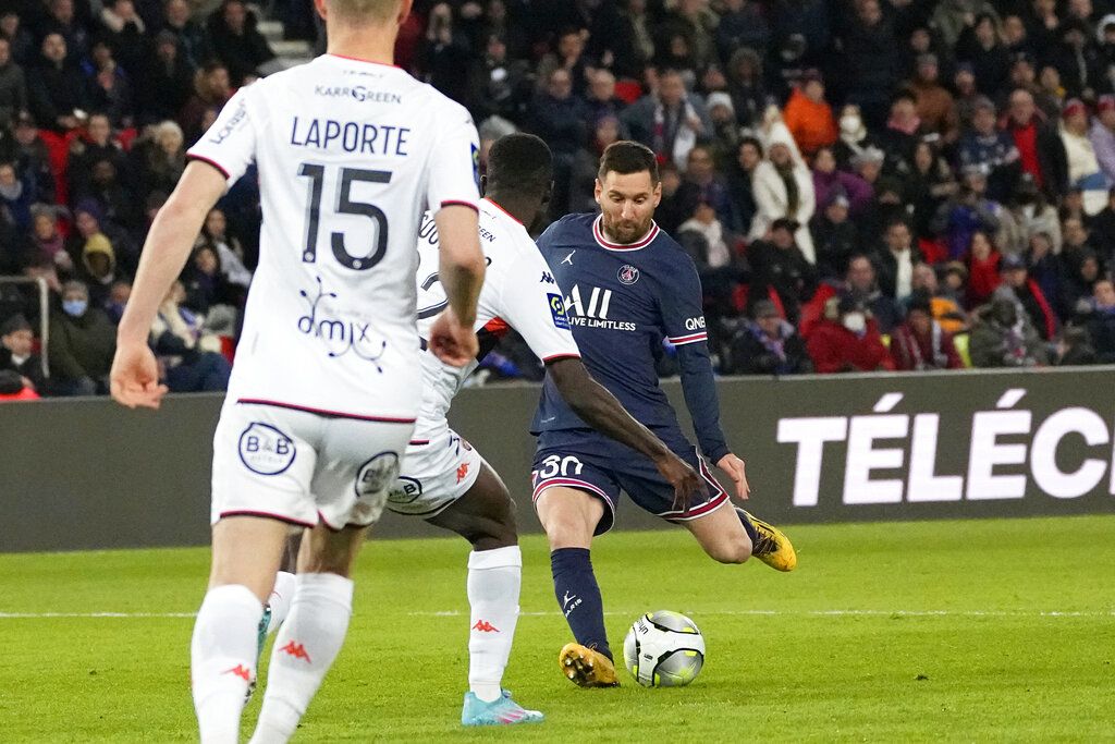 PSG's Lionel Messi celebrates after scoring his side's fourth goal during the French League One soccer match between Paris Saint Germain and FC Lorient at Parc des Princes stadium in Paris, Sunday, April 3, 2022. (AP Photo/Michel Euler)