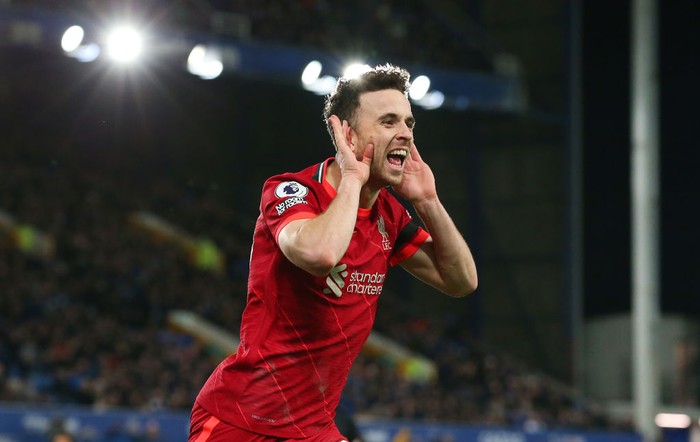 Diogo Jota LIVERPOOL, ENGLAND - DECEMBER 01: Diogo Jota of Liverpool celebrates after scoring their side's fourth goal during the Premier League match between Everton and Liverpool at Goodison Park on December 01, 2021 in Liverpool, England. (Photo by Alex Livesey/Getty Images)