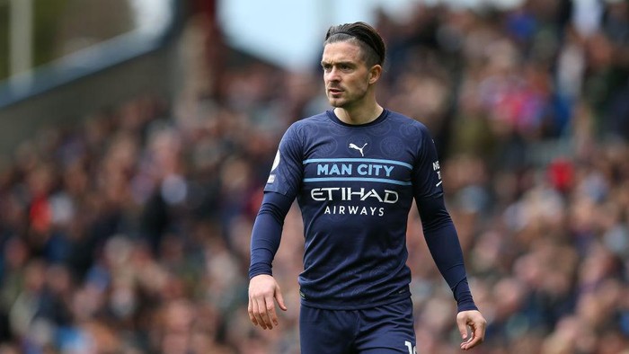 BURNLEY, ENGLAND - APRIL 02: Jack Grealish of Manchester City looks on during the Premier League match between Burnley and Manchester City at Turf Moor on April 02, 2022 in Burnley, England. (Photo by Alex Livesey/Getty Images)