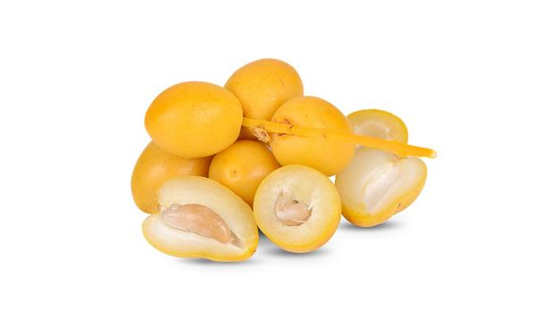 whole fresh Barhee/Barhi dates fruit on white background