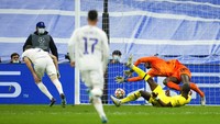 Karim Benzema memastikan kelolosan Madrid lewat golnya di menit ke-104.