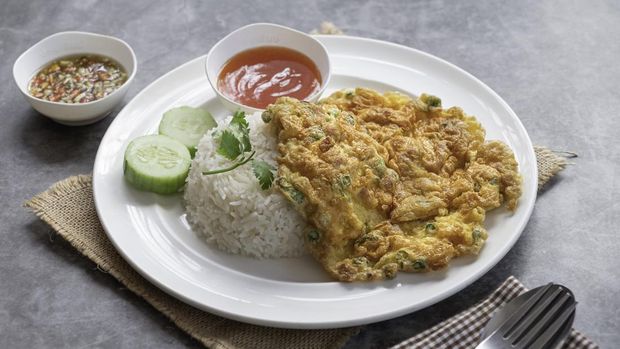 Thai style pork omelette with rice.