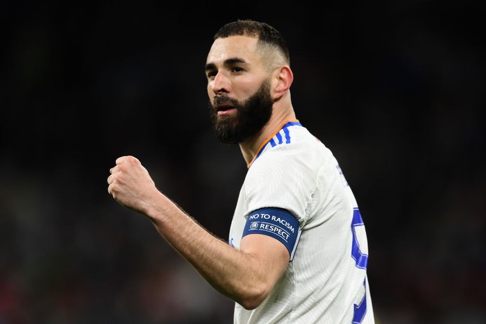 Karim Benzema MADRID, SPAIN - APRIL 12: Karim Benzema of Real Madrid celebrates after scoring their team's second goal during the UEFA Champions League Quarter Final Leg Two match between Real Madrid and Chelsea FC at Estadio Santiago Bernabeu on April 12, 2022 in Madrid, Spain. (Photo by David Ramos/Getty Images)