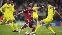 Bayern memecah kebuntuan pada menit ke-52 melalui gol Robert Lewandowski. (AP/Matthias Schrader)