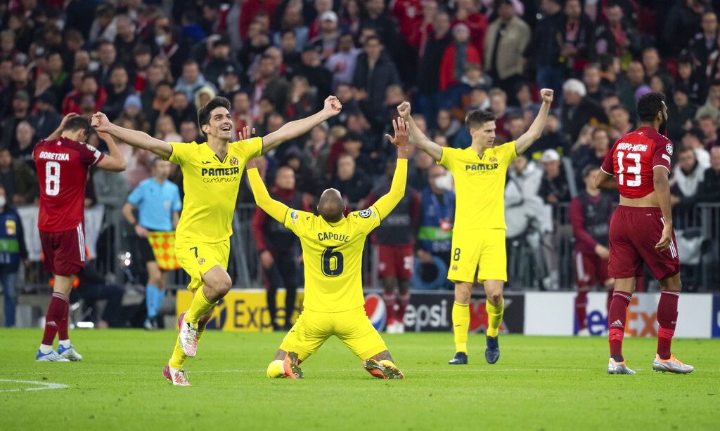 Villareal players celebrate end of the Champions League, second leg, quarterfinal soccer match between Bayern Munich and Villareal at the Allianz Arena, in Munich, Germany, Tuesday, April 12, 2022. (Sven Hoppe/DPA via AP)