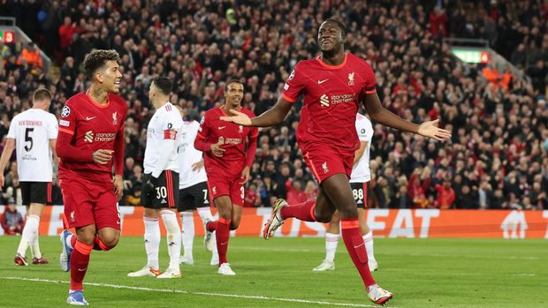 Soccer Football - Champions League - Quarter Final - Second Leg - Liverpool v Benfica - Anfield, Liverpool, Britain - April 13, 2022 Liverpool's Ibrahima Konate celebrates scoring their first goal with Roberto Firmino REUTERS/Phil Noble