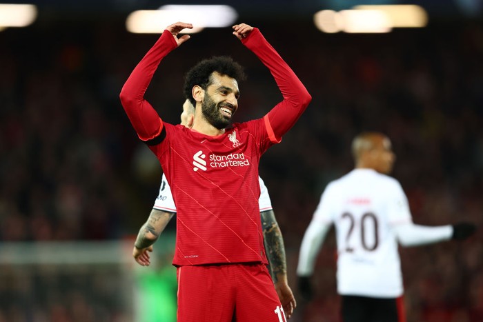 LIVERPOOL, ENGLAND - APRIL 13: Mohamed Salah of Liverpool reacts after a missed chance during the UEFA Champions League Quarter Final Leg Two match between Liverpool FC and SL Benfica at Anfield on April 13, 2022 in Liverpool, England. (Photo by Clive Brunskill/Getty Images)