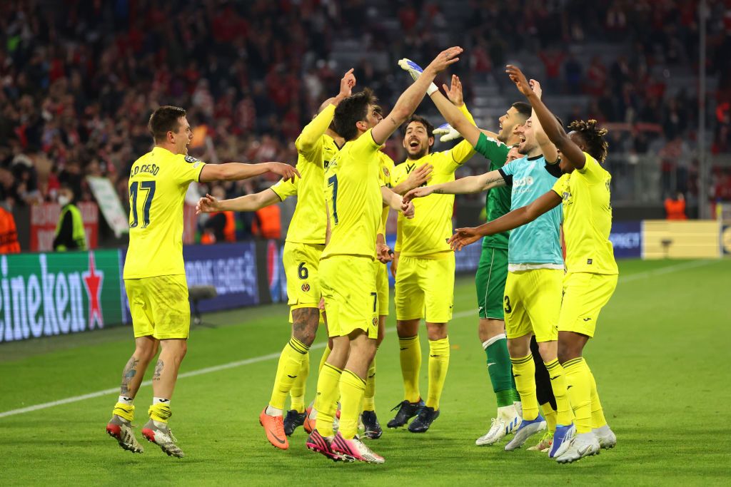 MUNICH, GERMANY - APRIL 12: Players of Villarreal CF celebrate following their draw and advancement in the UEFA Champions League Quarter Final Leg Two match between Bayern München and Villarreal CF at Football Arena Munich on April 12, 2022 in Munich, Germany. (Photo by Alexander Hassenstein/Getty Images)