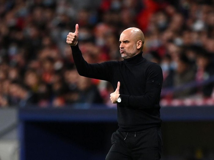 MADRID, SPAIN - APRIL 13: Manchester City Manager, Pep Guardiola reacts during the UEFA Champions League Quarter Final Leg Two match between Atletico Madrid and Manchester City at Wanda Metropolitano on April 13, 2022 in Madrid, Spain. (Photo by Shaun Botterill/Getty Images)