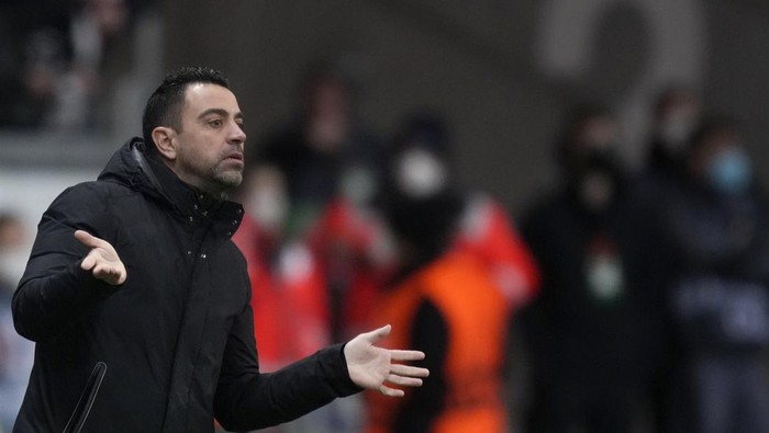 Barcelonas head coach Xavi Hernandez reacts during the Europa League quarter final, first leg soccer match between Eintracht Frankfurt and Barcelona at the Commerzbank Arena in Frankfurt, Germany, Thursday, April 7, 2022. (AP Photo/Michael Probst)