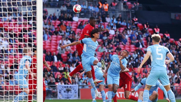 LONDON, ENGLAND - APRIL 16: Ibrahima Konate of Liverpool scores their sides first goal during The Emirates FA Cup Semi-Final match between Manchester City and Liverpool at Wembley Stadium on April 16, 2022 in London, England. (Photo by Catherine Ivill/Getty Images)