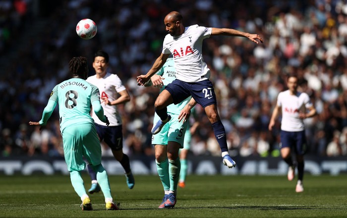 LONDON, ENGLAND - APRIL 16: Lucas Moura of Tottenham Hotspur wins a header during the Premier League match between Tottenham Hotspur and Brighton & Hove Albion at Tottenham Hotspur Stadium on April 16, 2022 in London, England. (Photo by Ryan Pierse/Getty Images)