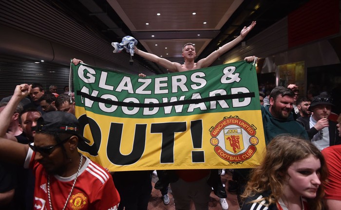 MANCHESTER, ENGLAND - APRIL 16: Manchester United fans take part in a protest outside the stadium prior to the Premier League match between Manchester United and Norwich City at Old Trafford on April 16, 2022 in Manchester, England. (Photo by Nathan Stirk/Getty Images)