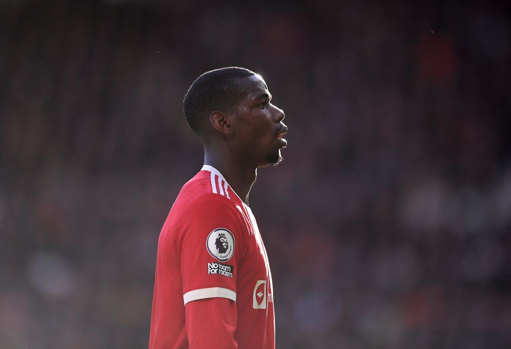MANCHESTER, ENGLAND - APRIL 02: Paul Pogba of Manchester United looks on during the Premier League match between Manchester United and Leicester City at Old Trafford on April 02, 2022 in Manchester, England. (Photo by Laurence Griffiths/Getty Images)