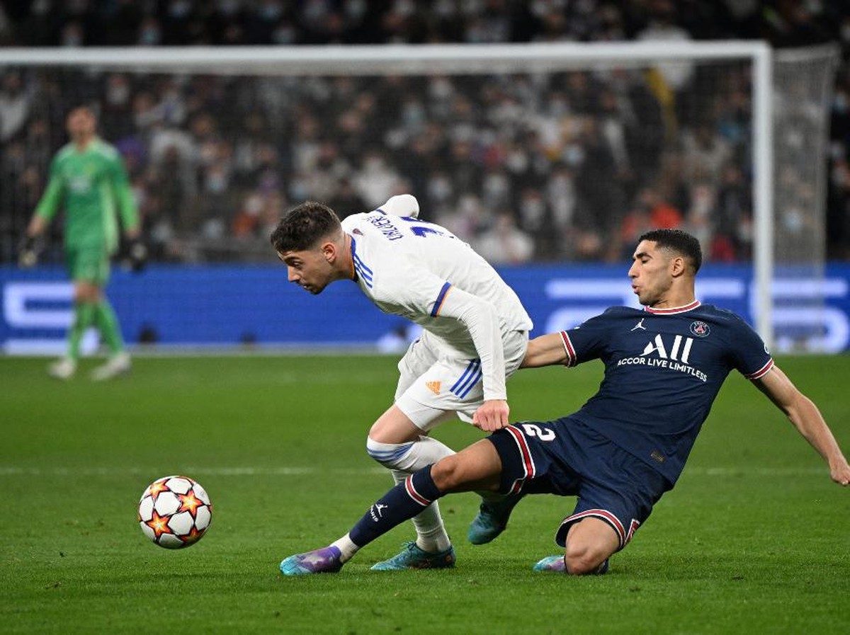 Head to head PSG vs Real Madrid. Laga yang jarang selesai imbang. (Foto: AFP/GABRIEL BOUYS)