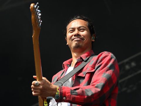 Dougy Mandagi from the band The Temper Trap performs at Lollapalooza in Chicago's Grant Park on Saturday, Aug. 2, 2014. (Photo by Steve C.  Mitchell/Invision/AP)